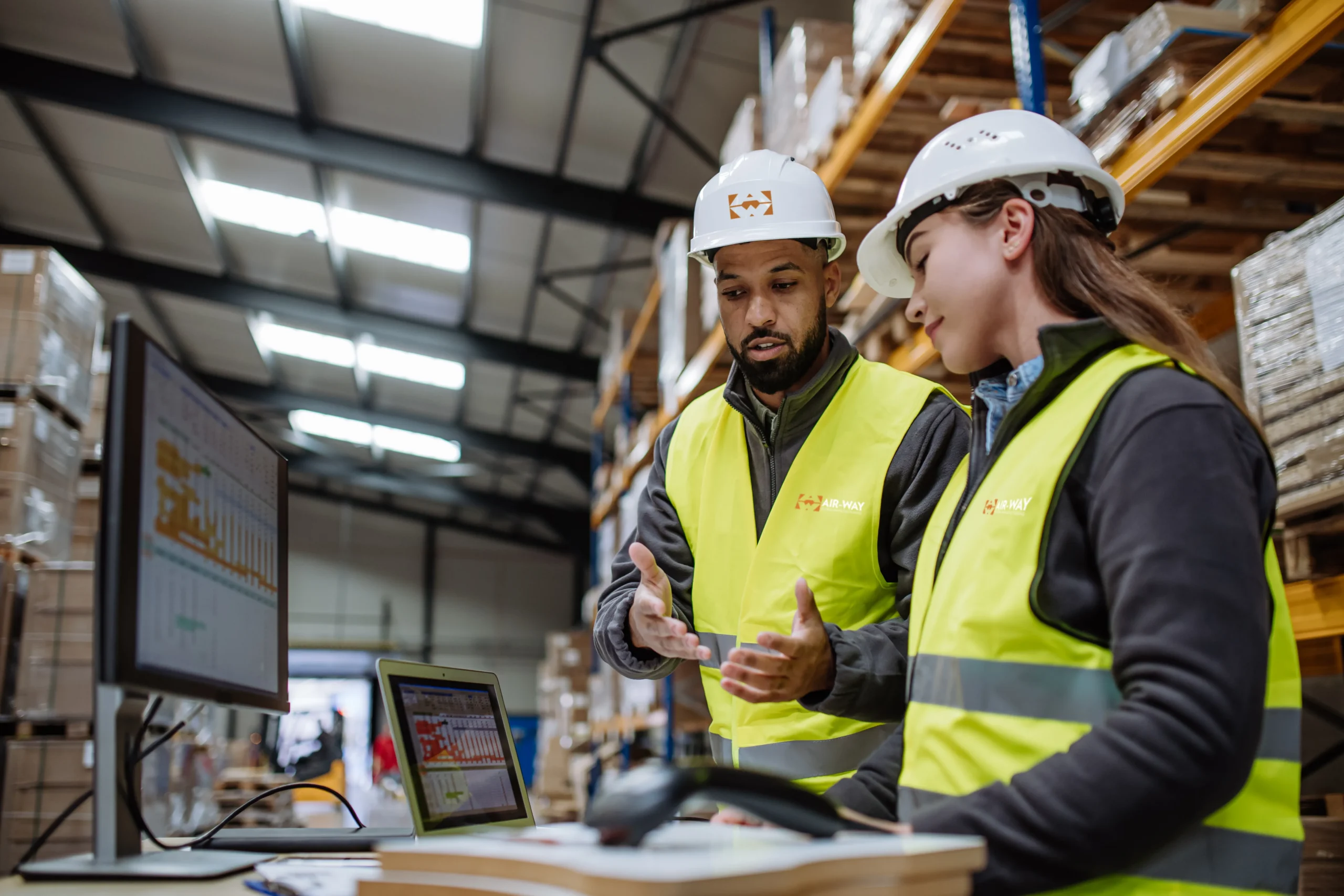 workers reviewing inventory