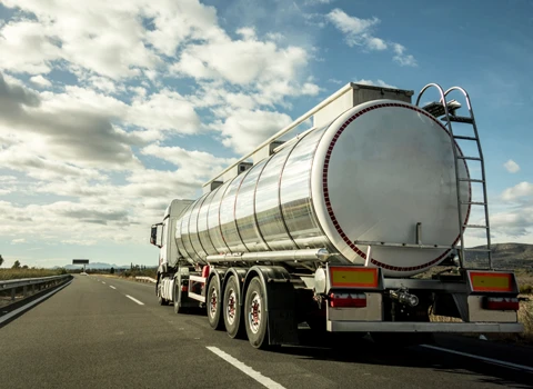 Semi Truck driving down a highway